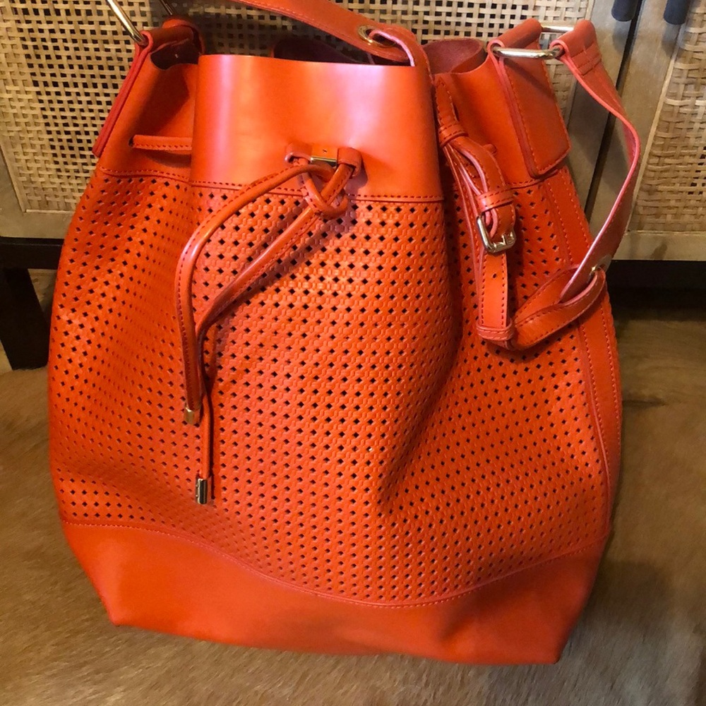 Vince Camuto perforated bucket drawstring bag